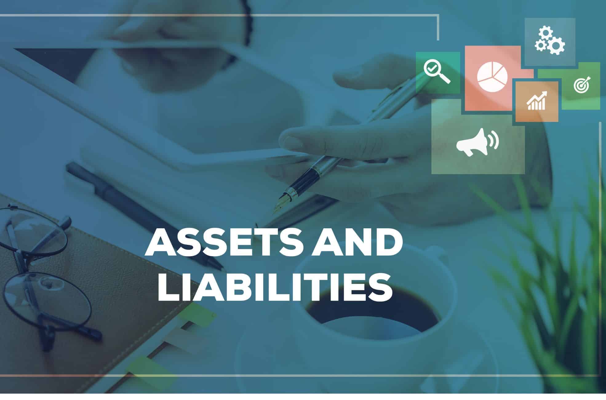 Man In Office Working On Assets And Liabilities