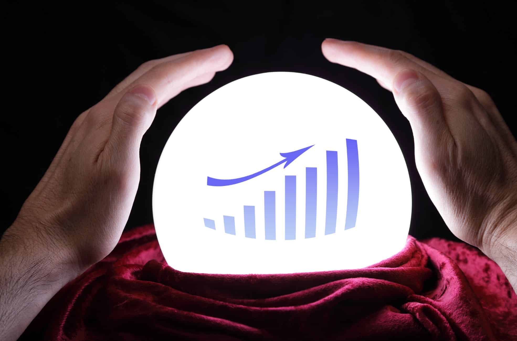 Hands Around Globe With Growth Chart Inside It