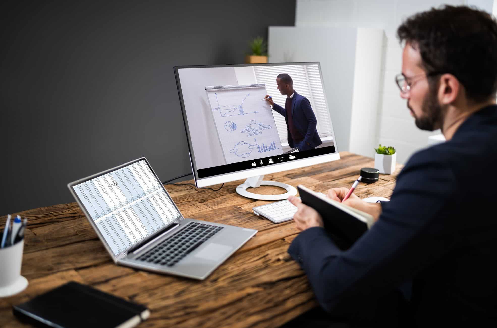 Man Doing Online Coaching On Laptop