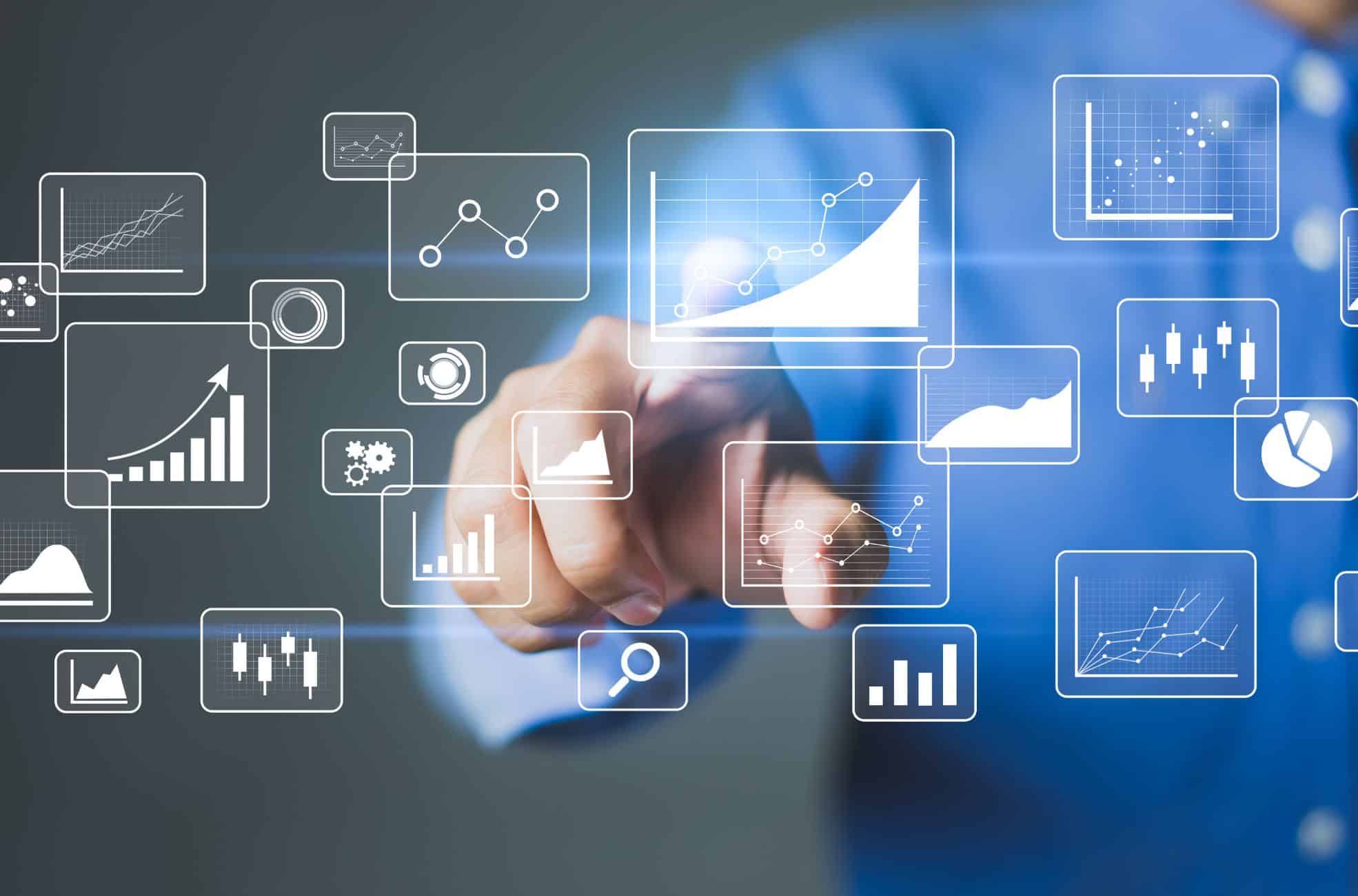 Business Man And Graphs