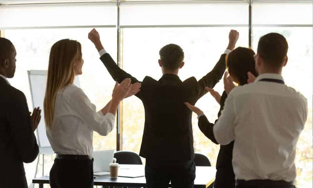 Business People Congratulating Entrepreneur On Initiatives
