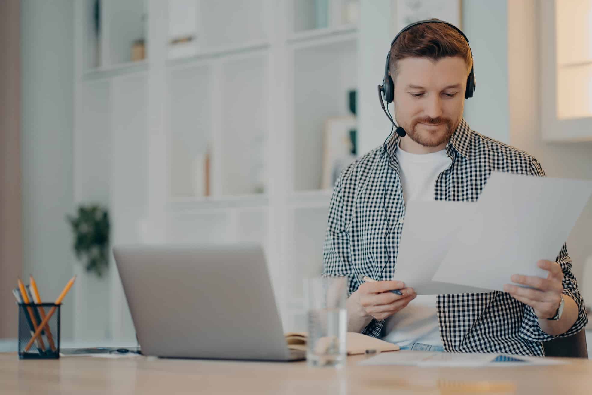 A stock photo of a man filing documents- these are required for an offshore company formation.
