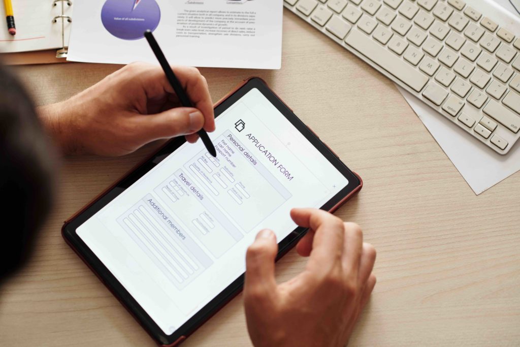 Entrepreneur filling out visa application form-2