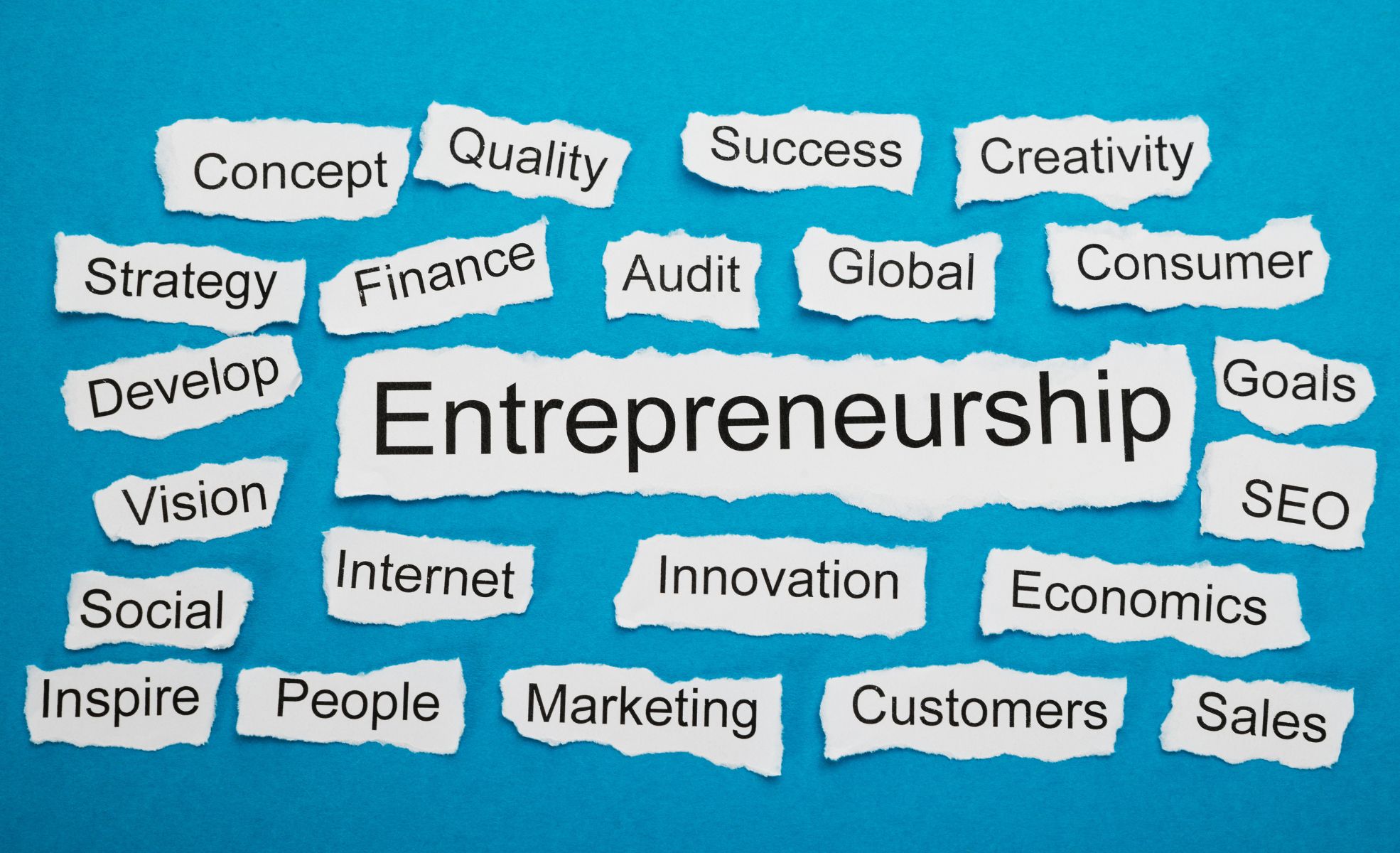 Entrepreneurship Written On Ripped Paper