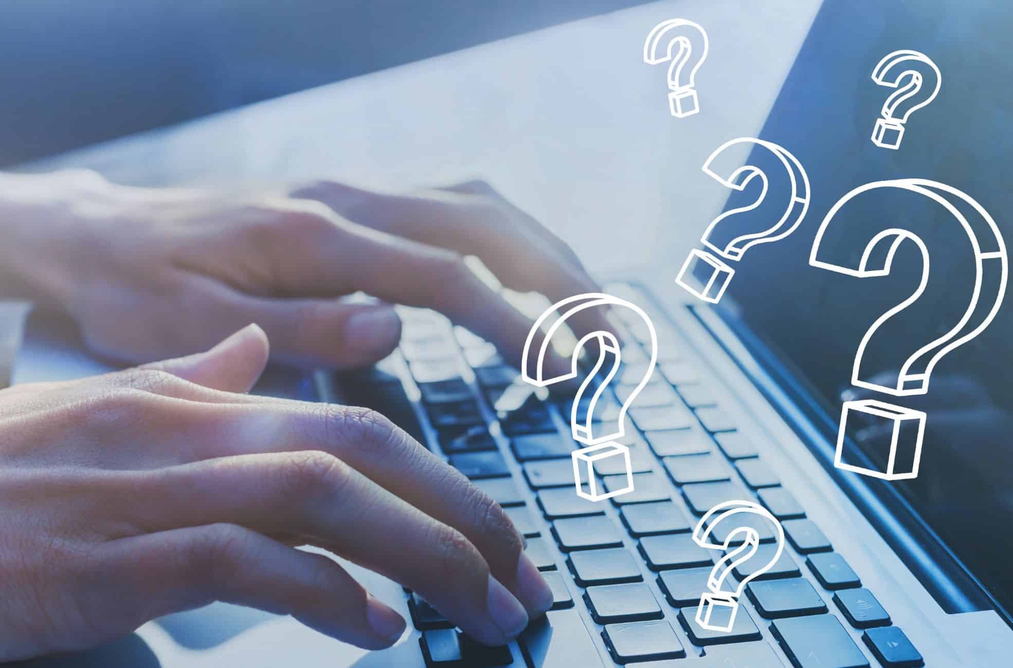 FAQ Section Shown With Question Marks Over Laptop
