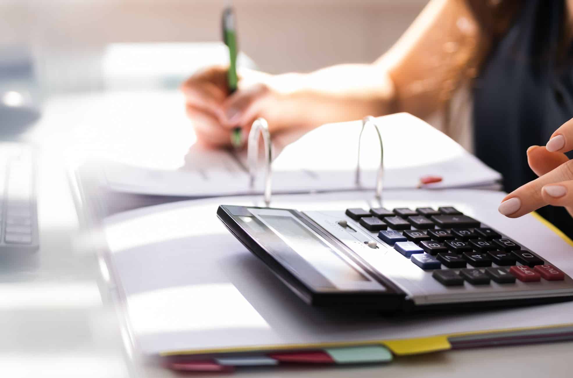 A picture of someone working out their business' year-over-year growth in the 2024 period.