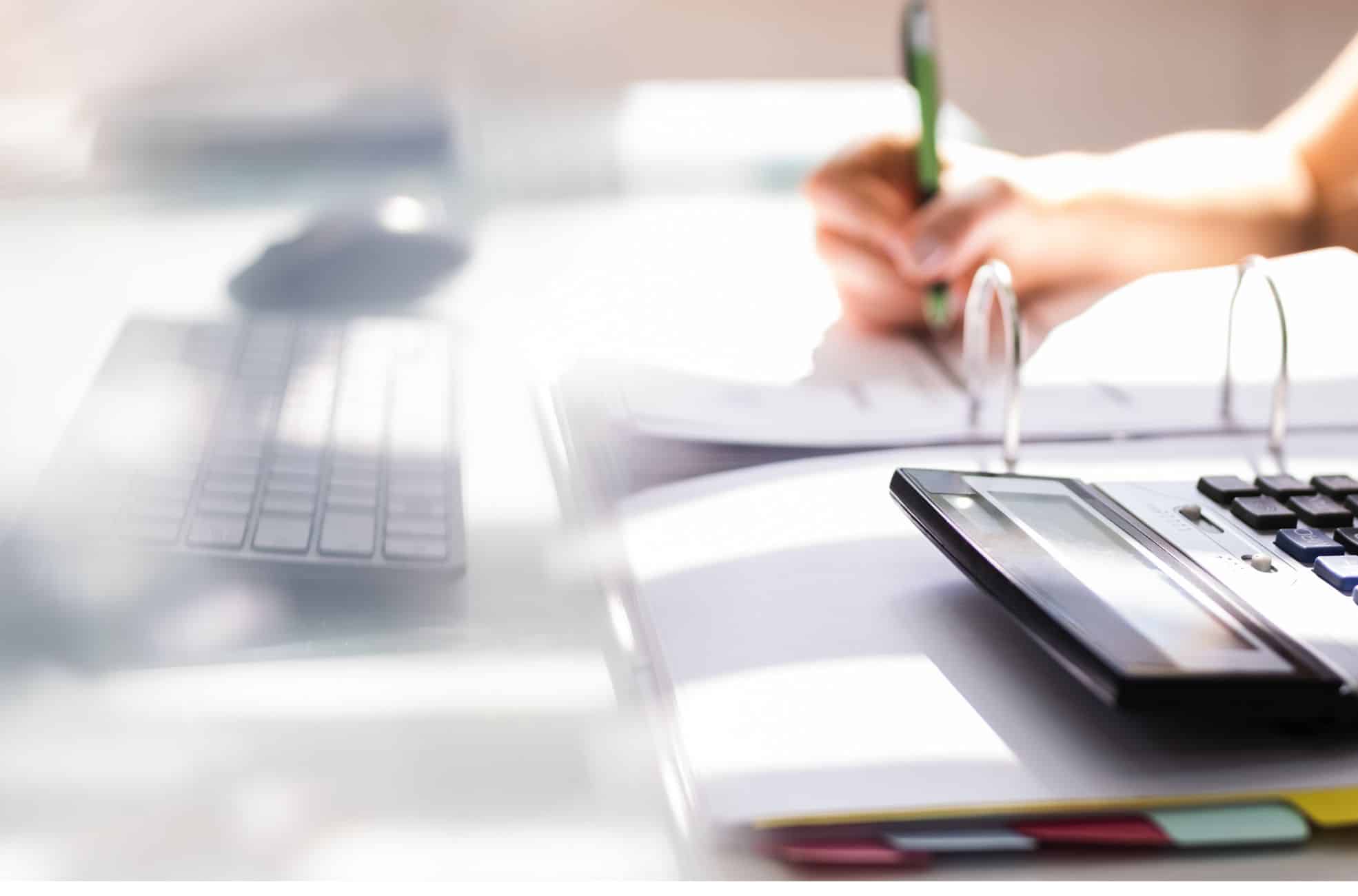 Accountant Working On Business Expenses