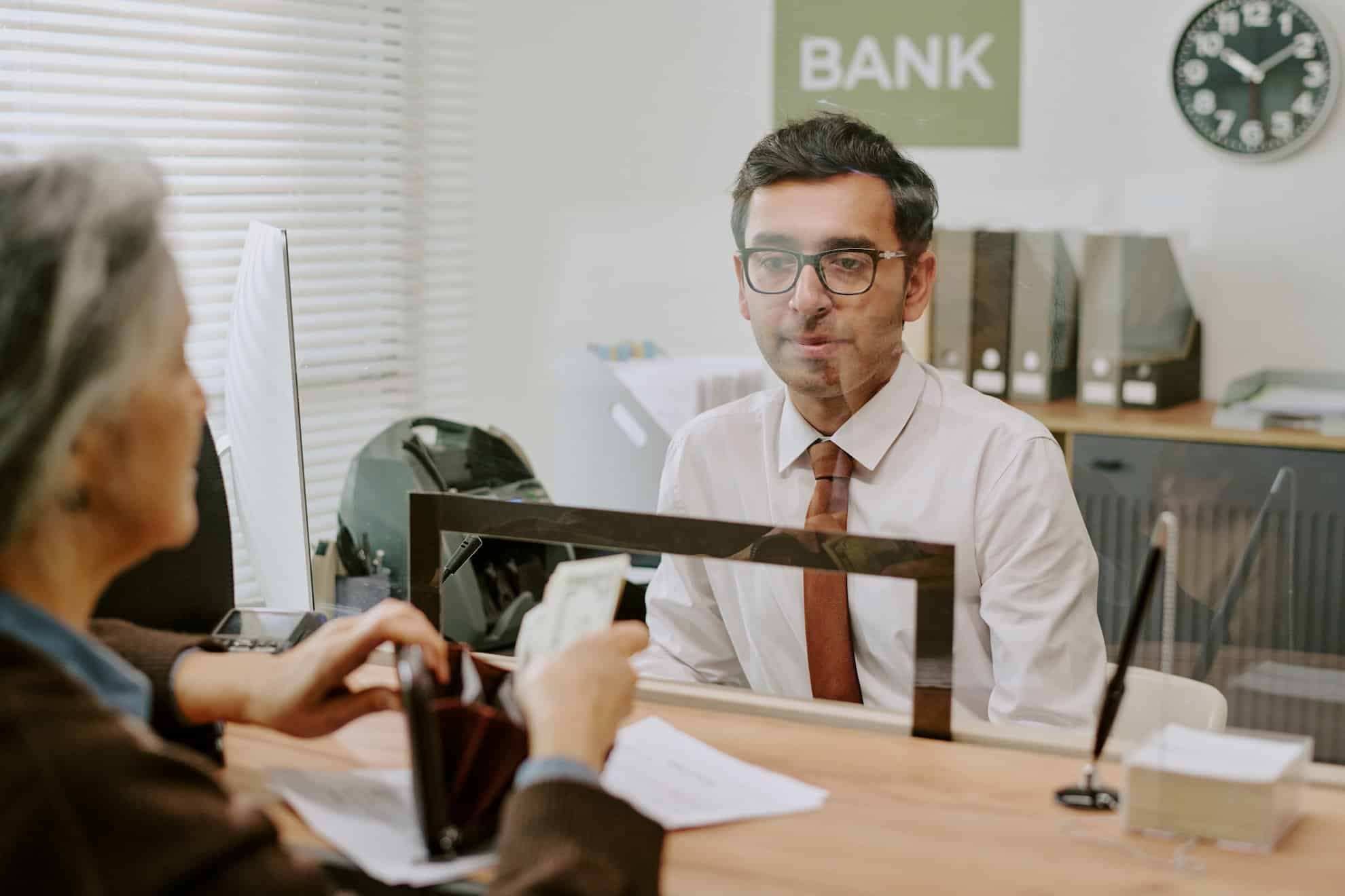 A woman opening her business bank account in Dubai.