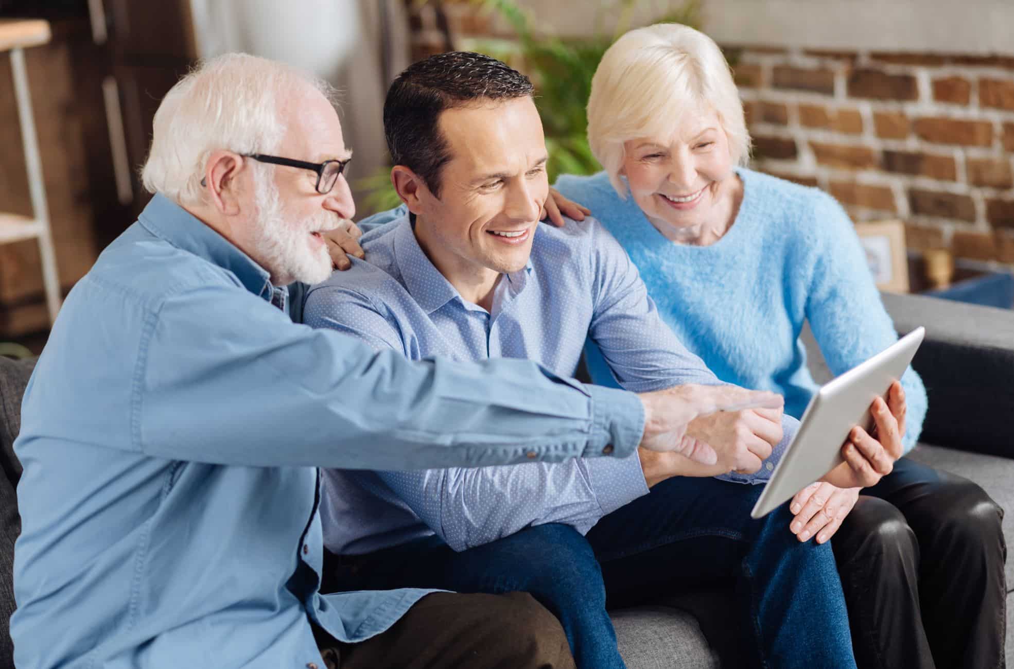 Young Man With Elderly Couple