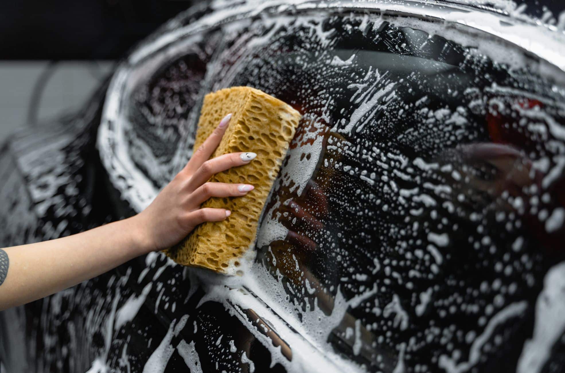 Woman Doing A Car Wash