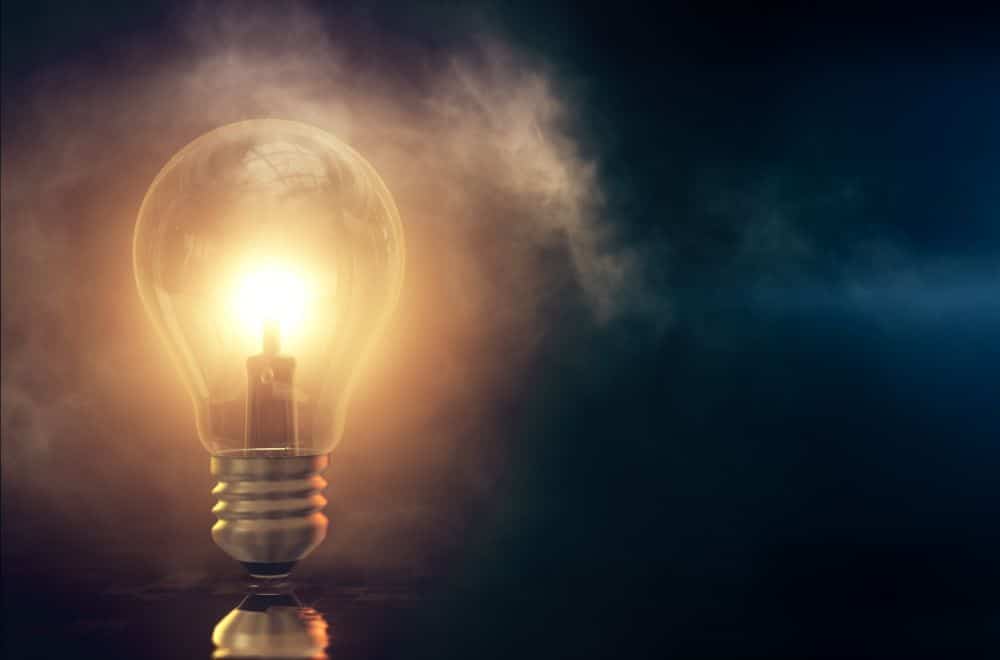 Lightbulb And Smoke Dark Background