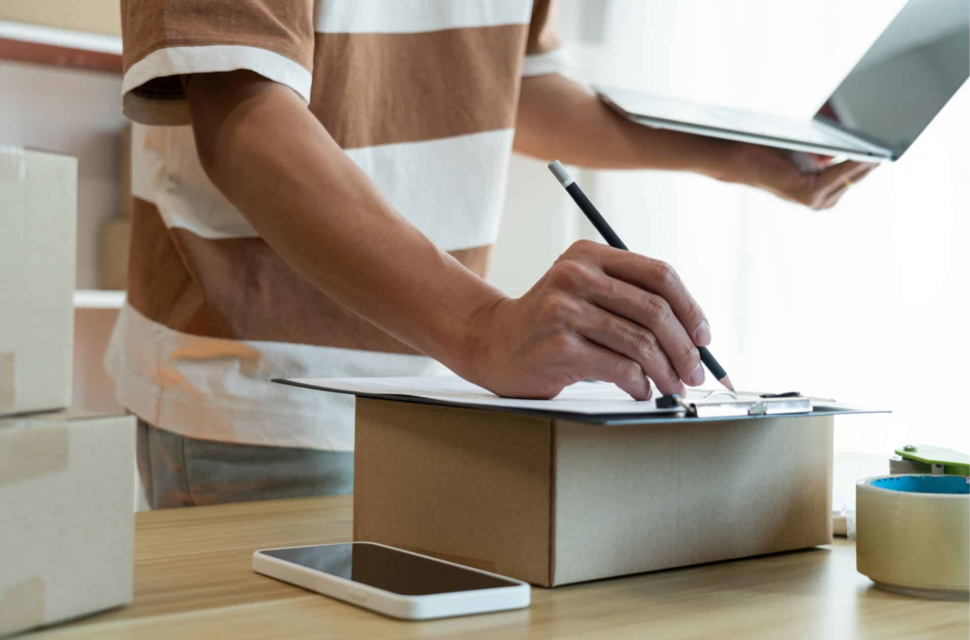 Person Working With Technology And Parcels