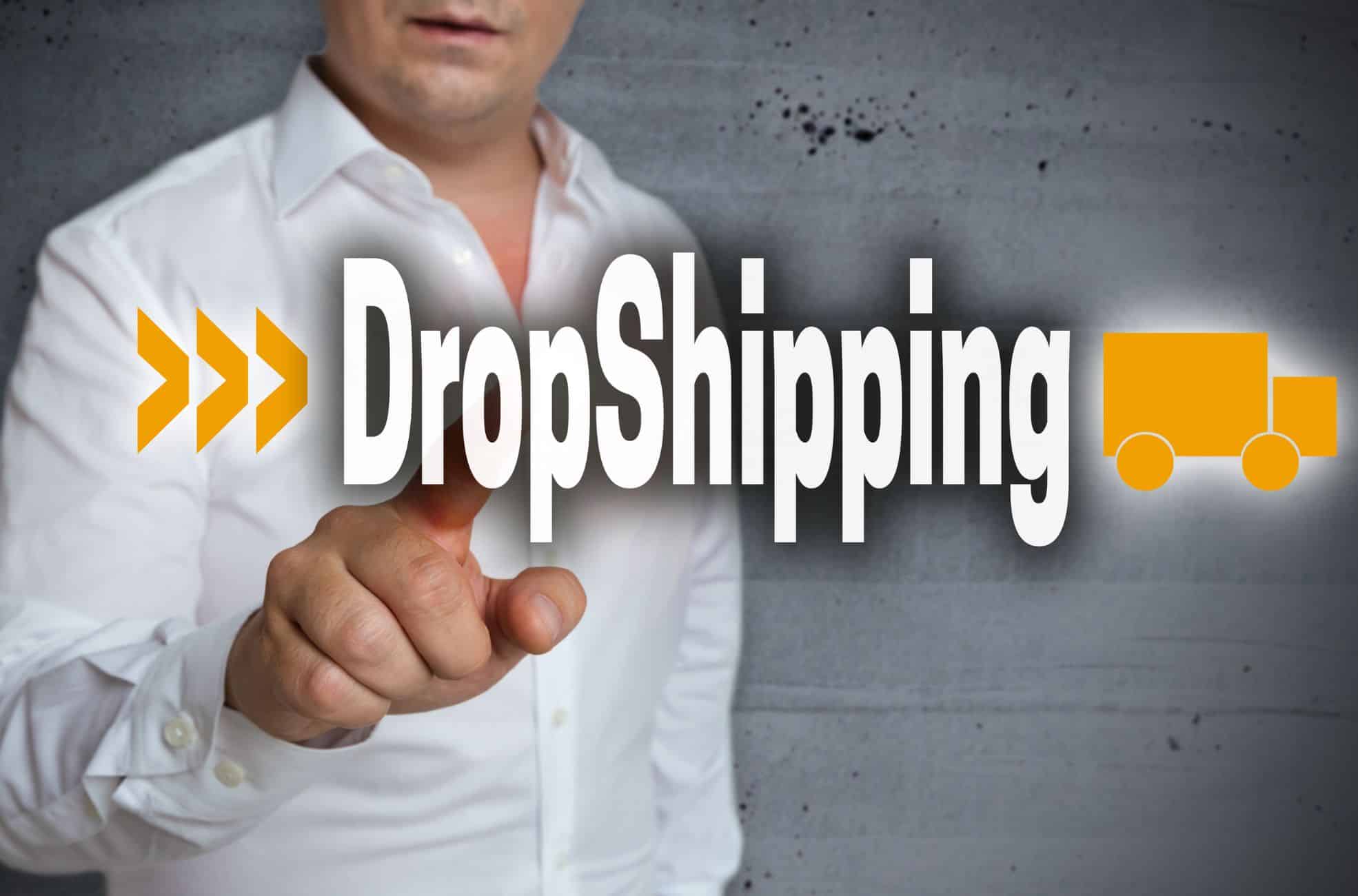 Businessman Pointing To Word "Dropshipping"