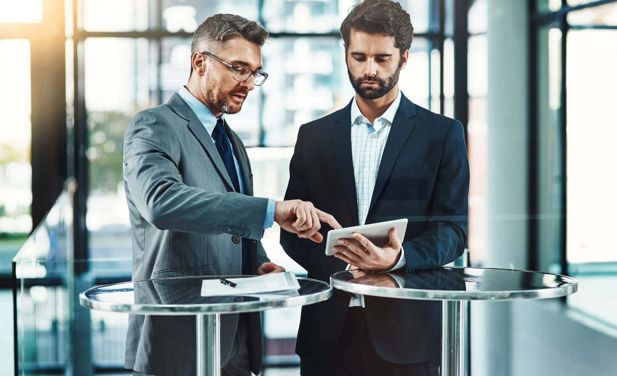 Businessmen Working In Tech Company