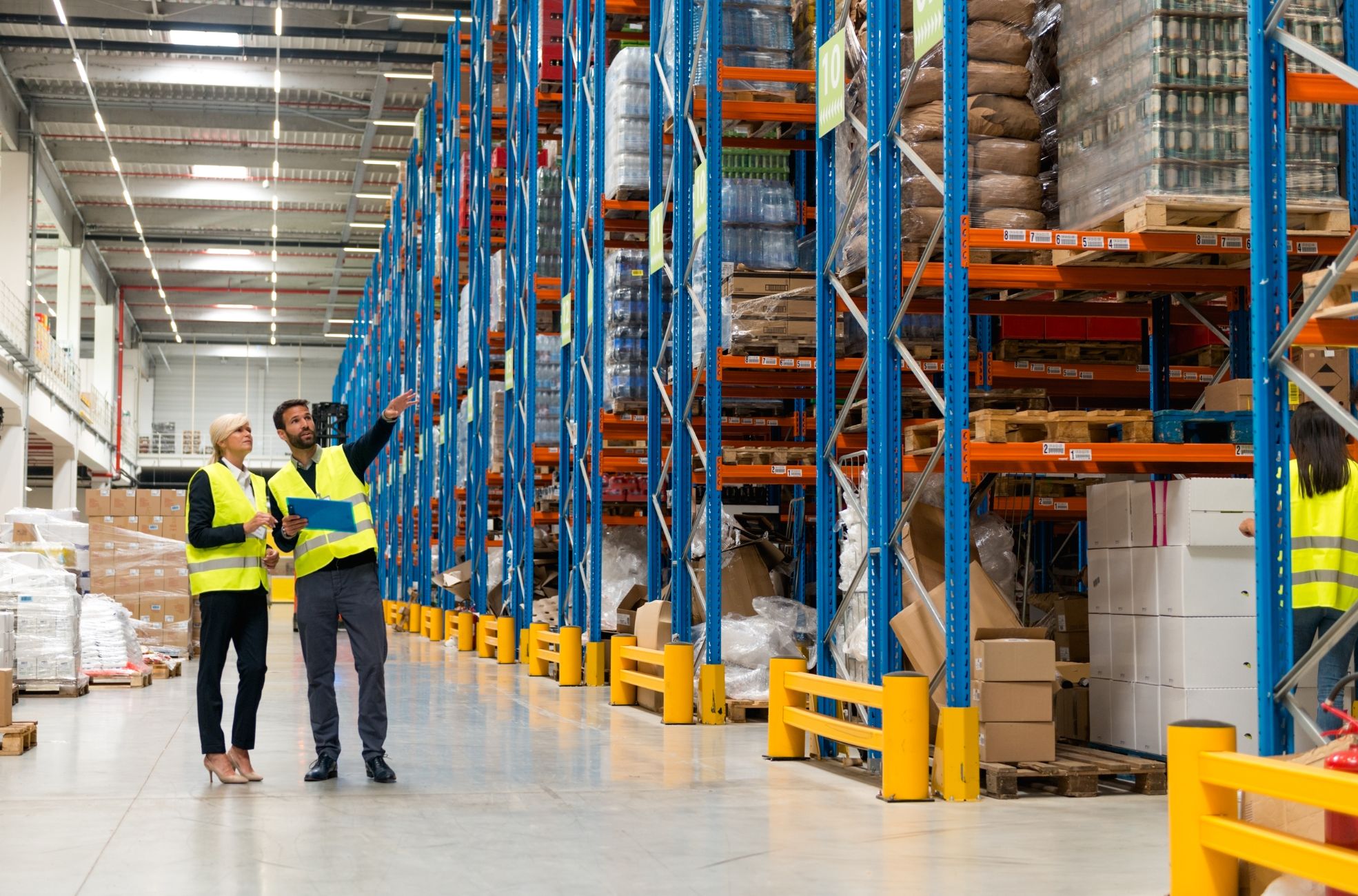 Inside Of A Warehouse With Employees